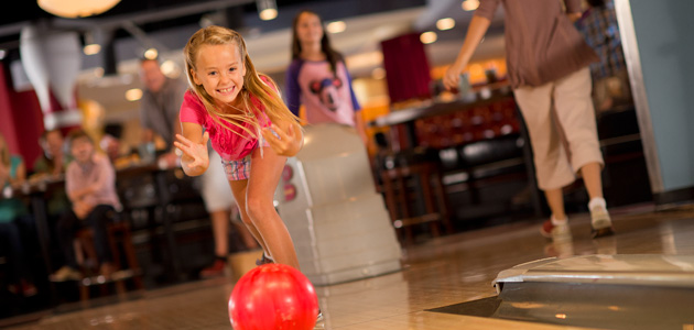 Young girl enjoys bowling at Splitsville Luxury Lanes