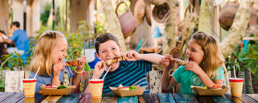 Children enjoying a meal at Harambe Market in Disney's Animal Kingdom